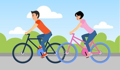 Couple of man and woman are riding a bicycle outdoors