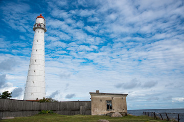 old white lighthouse, summer sunny day © comradelukich