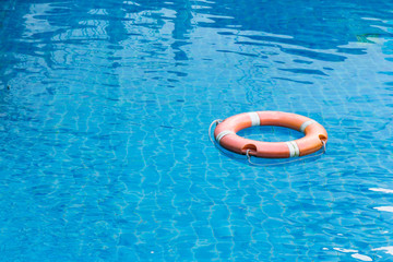 lifebuoy floating in swimming pool