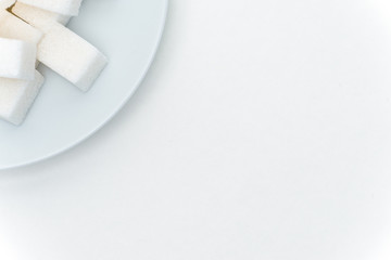 Marshmallow on a saucer against a light background