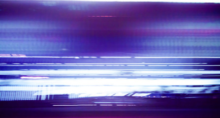 Blurred Abstract image of Long exposure night traffic light in the city