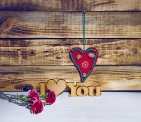  inscription I love you on a wooden background