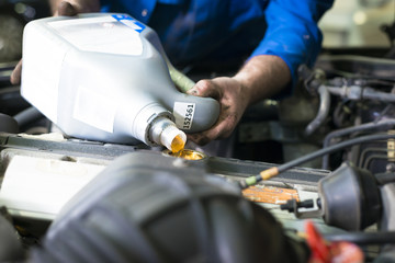 Car servicing, oil and filter replacing maintenance