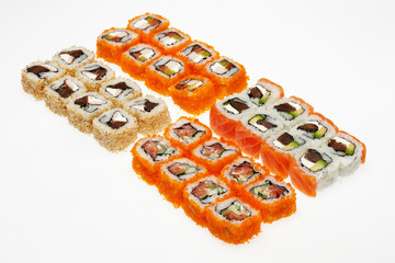 Roll sushi on a plate isolated on white background.