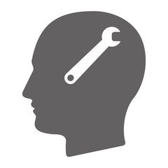 Isolated male head with a spanner