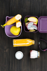 Photo of different fruits lying in boxes