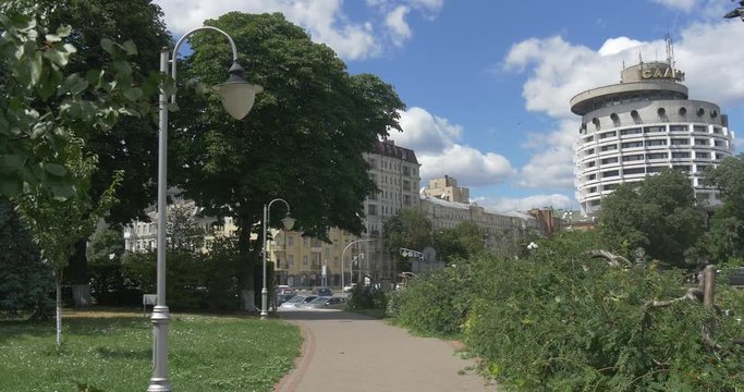Saljut Hotel and a Well Groomed Park With Old Lampposts, Well Cut Bushes and a Nice Lane on Slava Square in the Capital of Ukraine in Kiev in Summer