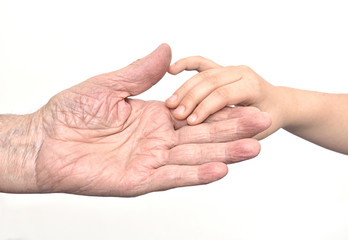Hands of  old man and child
