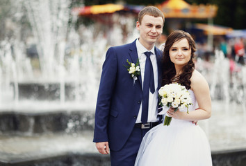 Happy couple at the fountain near  National Opera