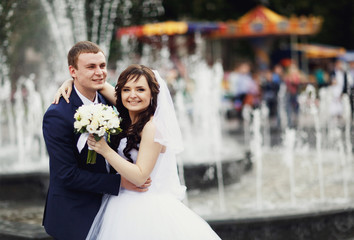 Happy couple at the fountain near National Opera