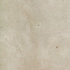 Gray cement background with small inclusions.
