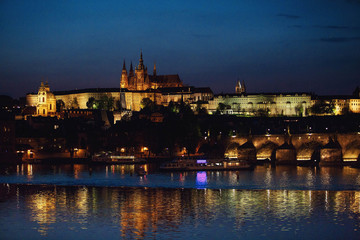 Fototapeta na wymiar incredible view of evening illuminated bridge and river