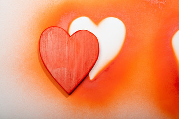 Holidays gift and heart on a white background.