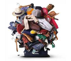 Big heap of different clothes and shoes