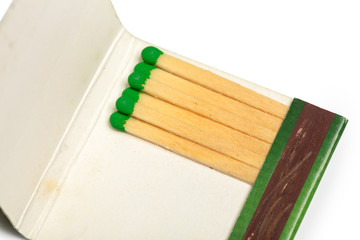 Matches isolated on white background. Closeup shot.