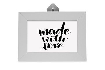 Made with love. Handwritten text. White photo frame. Modern calligraphy.