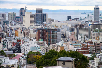 Cityscapes of Kobe in Fog winter, Skyline of Kobe, office building and downtown of Kobe Bay, Japan,...