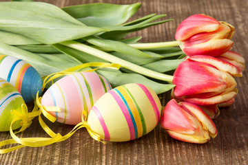 Easter eggs and fresh spring tulips
