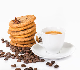Coffee break /
Coffee cup with a stack of cookies and coffee beans on a white background