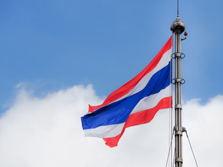 Thailand flag blows in the wind against a sky background