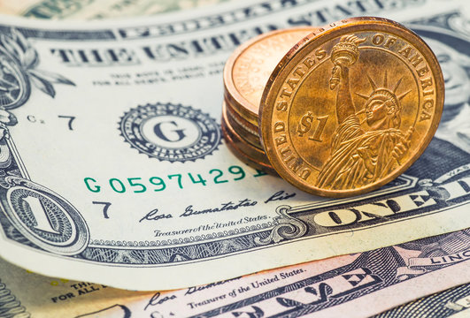 Still Life with cash dollars and cents US.
