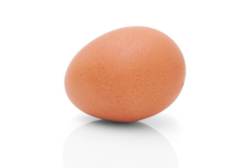 One brown chicken egg for cooking. Profile shot. Isolated on white background with shadow reflection. Single brown chicken egg for baking, on white background. One egg to kitchen. Whole one egg