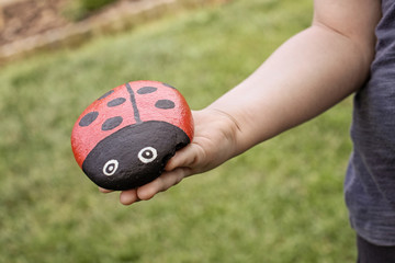 Handmade ladybird made from a painted stone