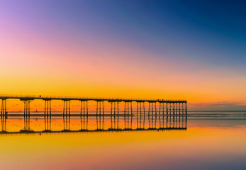 Fototapeta premium Sunset pier at Saltburn by the Sea, North Yorkshire, UK