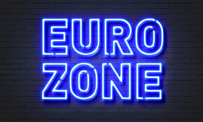 Euro zone neon sign on brick wall background.
