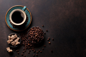 Coffee cup, beans and sugar