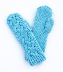 Blue knitted woolen mittens with ornament