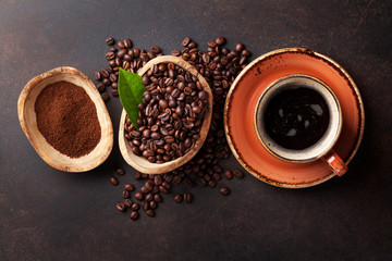 Coffee cup, beans and ground powder