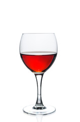 Glass with red wine on white background