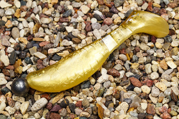 Golden silicone fishing bait for a jig spin