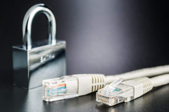 Network security concept and secure connection to Internet. Metal lock.