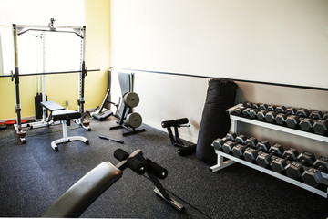 Exercise equipment in empty gym