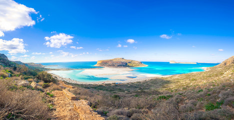 Fototapeta na wymiar Amazing panorama of Balos Lagoon with magical turquoise waters, lagoons, tropical beaches of pure white sand and Gramvousa island on Crete, Greece