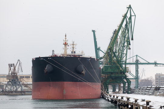 Large cargo ship in a dock at port