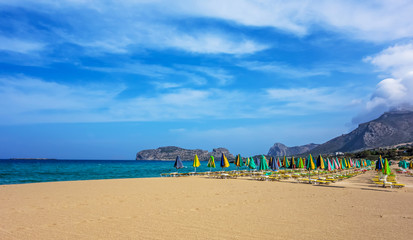 Empty beach with umbrellas.