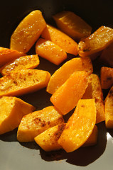 Raw cucumber green spaghetti in white bowl with vegetable at wood table 
