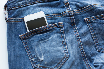 smartphone in pocket of denim pants or jeans