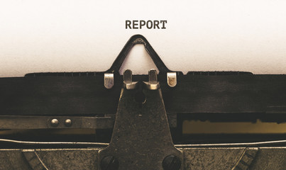 Report, Text on paper in vintage type writer from 1920s