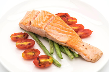grilled salmon steak on white