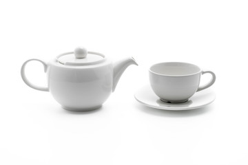 white tea pot with tea cup