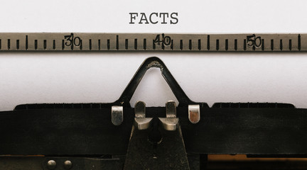 Facts Text on paper in vintage type writer from 1920s
