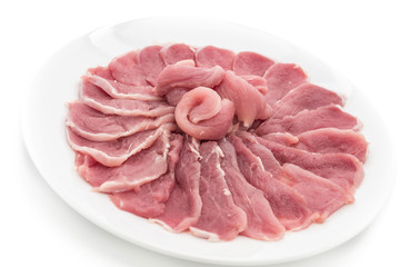 fresh sliced pork on white