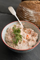 Pate and Spoon in Bowl Beside Bread Loaf