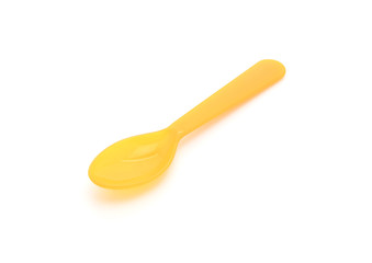 yellow plastic spoon