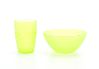 green plastic bowl and glass