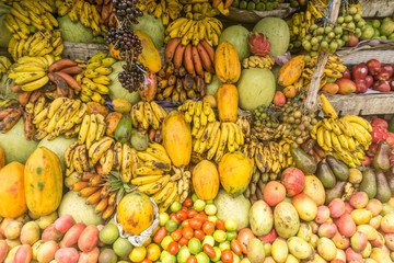 Fruits shop on tropical marketplace